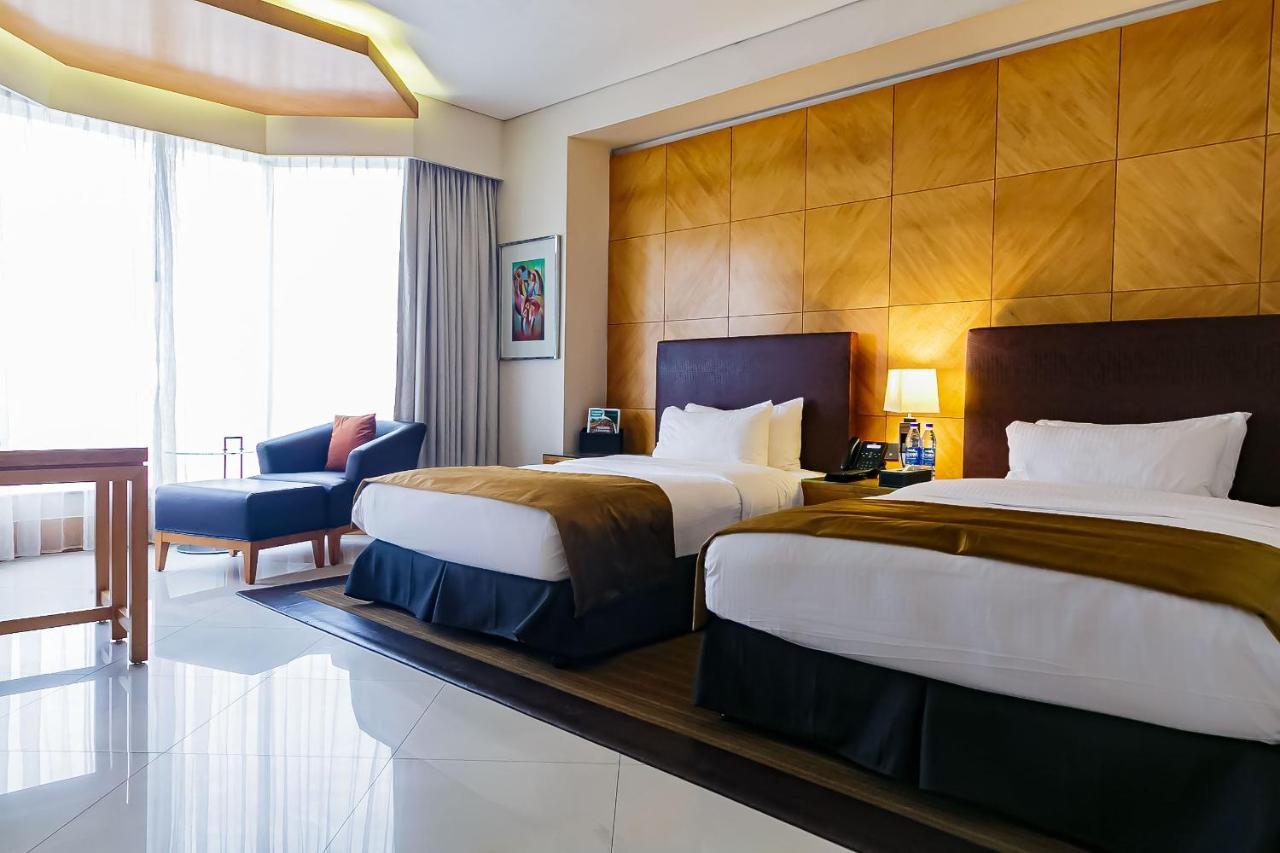 Lagos Continental Hotel Eksteriør bilde Deluxe Room