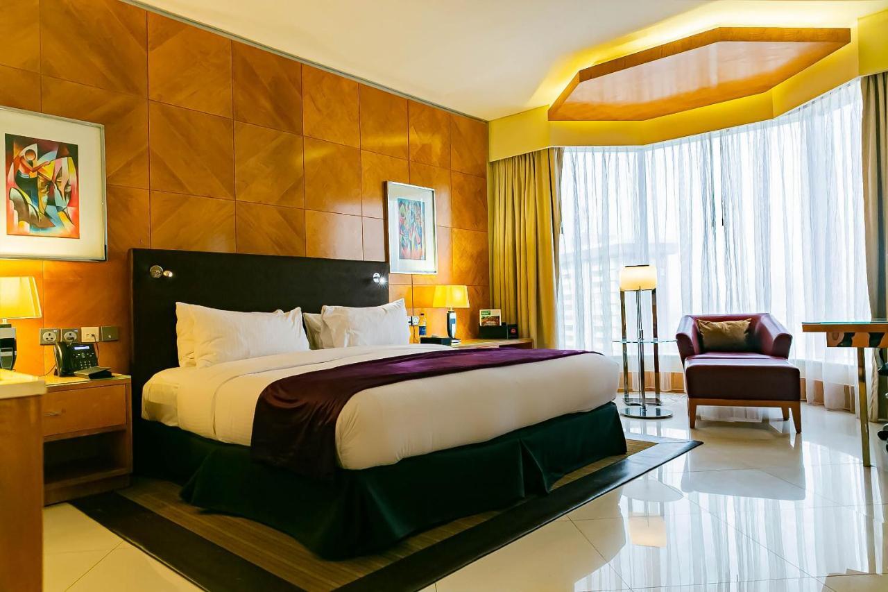 Lagos Continental Hotel Eksteriør bilde A bedroom at the hotel